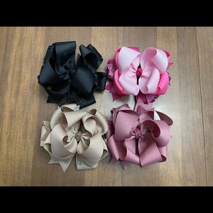 Four 6” triple Bows